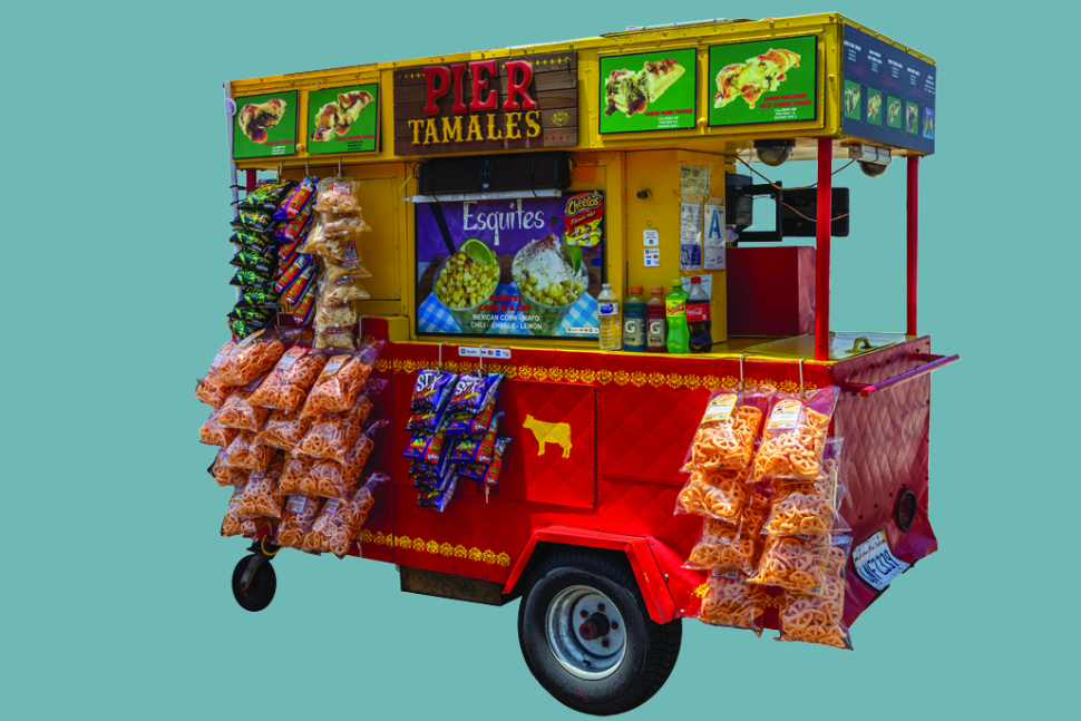 Food cart on wheels whose sign reads "Pier Tamales"