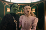 Screencap from Wicked depicting an awe-struck Elphaba and Glinda