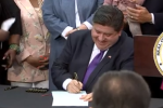 Illinois Gov. JB Pritzker signs the anti-book-ban law in 2023 in a Fox screencap