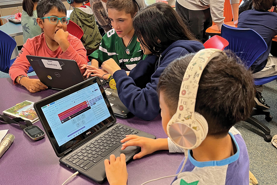 Fourth-grade students at George A. Jackson Elementary School in Jericho, New York, work on podcasts. The project was spearheaded by their librarian and teachers.