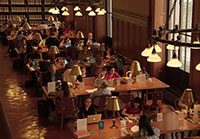 Patrons in a busy reading room in a screencap from Ex Libris