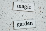 Magnetic Poetry tiles reading Magic Garden