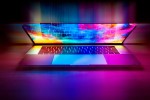 Partially opened laptop with a colorful screen