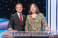 Jeopardy! host Ken Jennings (left) with contestant Adriana Harmeyer. Photo by Disney/Christopher Willard.
