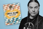 Sean Sherman with the cover of his book, Turtle Island