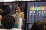 Ethel Adolphe speaking at New Orleans Public Library at the resolution presentation in 2018