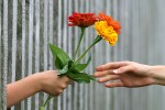Flowers handed from person to person