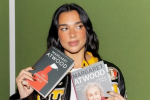 Dua Lipa holding books by Margaret Atwood