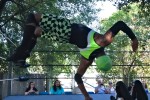 Wrestler flipping during a Lucha Libro match at Dixon Library