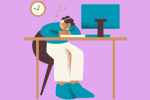 Person napping at a computer desk