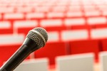 Microphone in front of seats