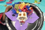 Sugar skull with colorful hair made during a library program.